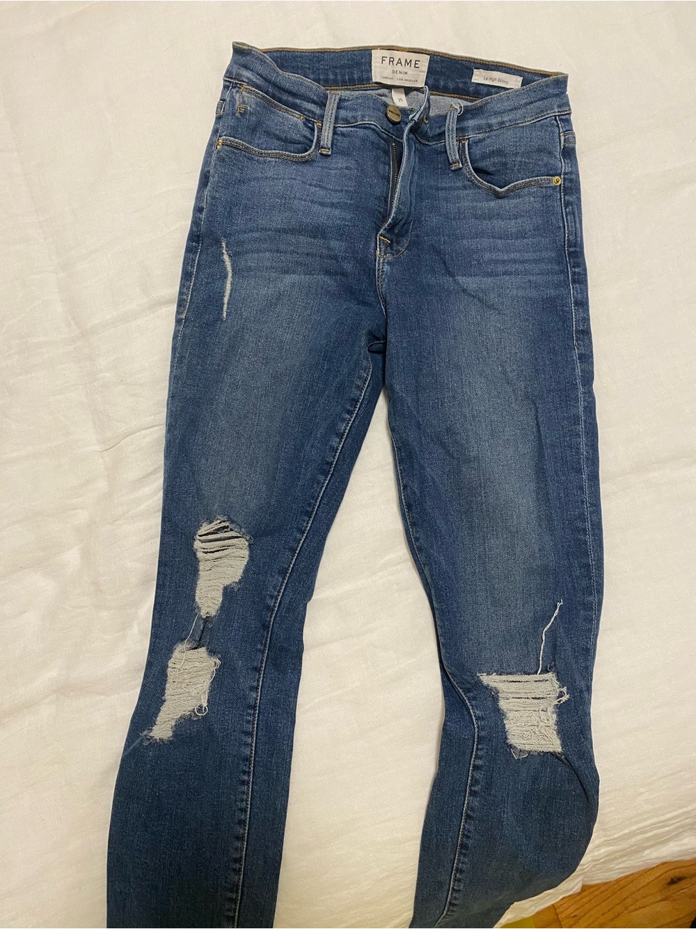 Frame Denim Skinny Jeans in Distressed Dark Blue
